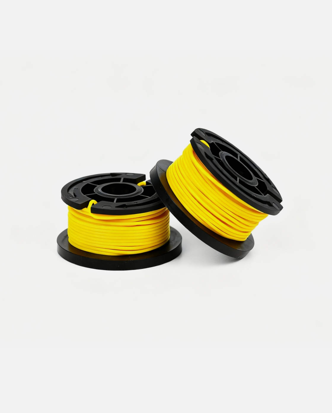 Yellow trimmer line spool with black plastic housing, two spools shown side by side on white background