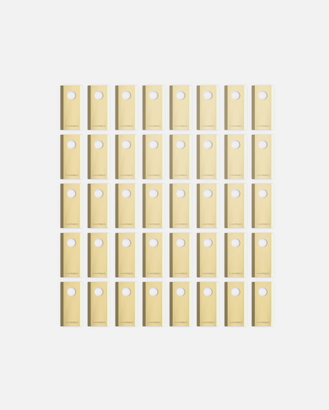40-piece set of beige cutting blades with circular hole and YARBO branding, arranged in grid pattern on white background