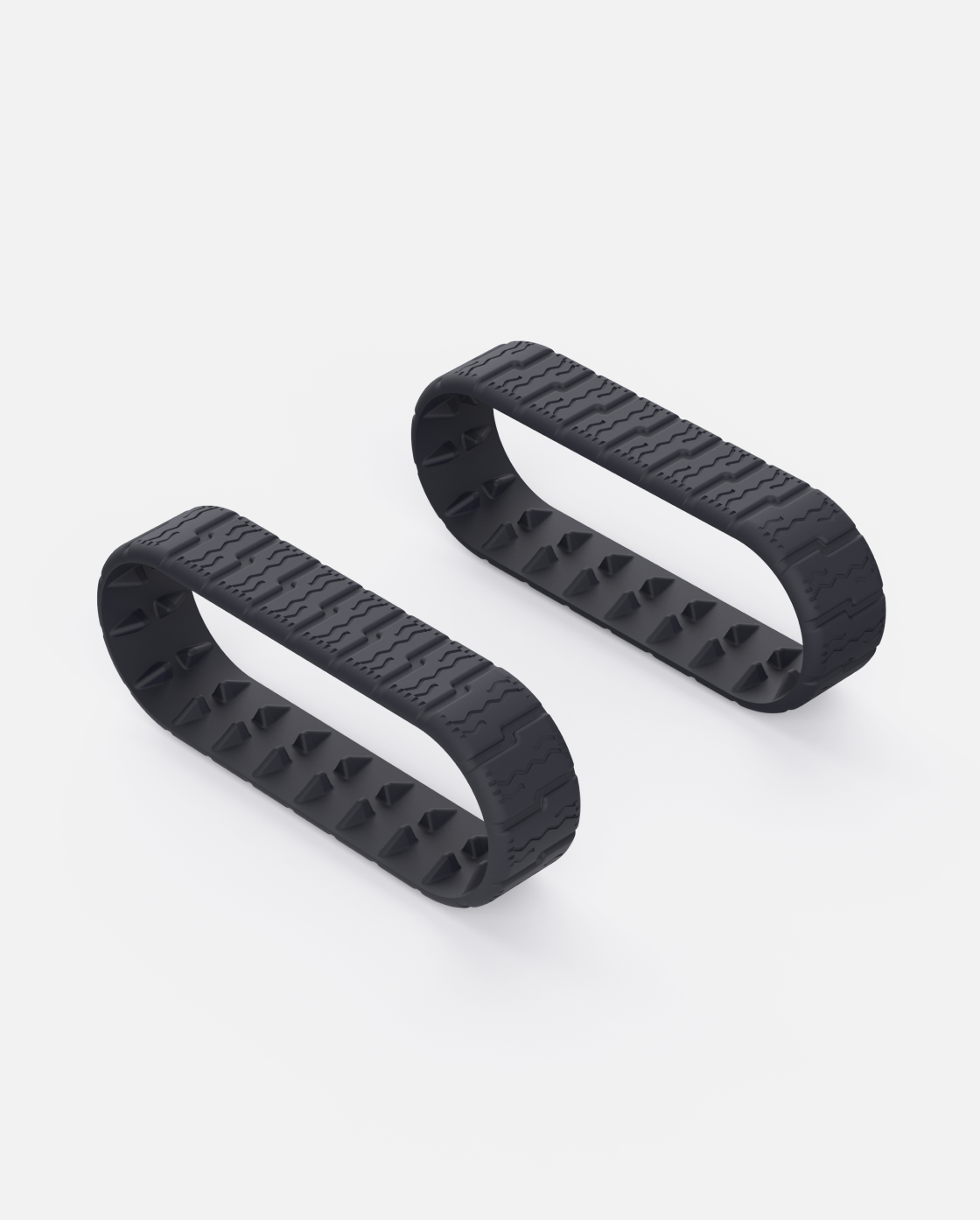 Black rubber Lawn Track (Y Series) with zigzag tread and triangular studs, shown in side view on white background