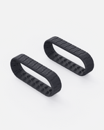 Black rubber Lawn Track (Y Series) with zigzag tread and triangular studs, shown in side view on white background
