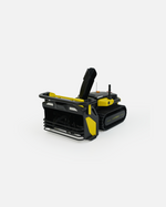 Mini black and yellow snow blower model by Yarbo, featuring tracked base and front chute, side view on white background